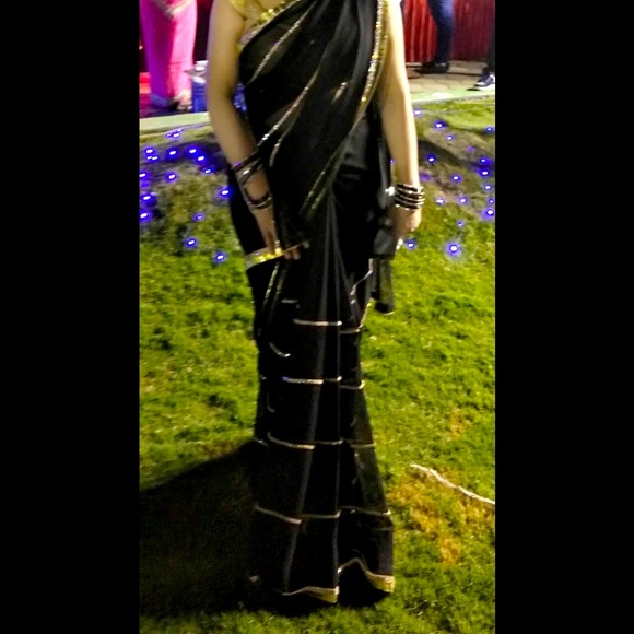 Sleek chic party wear black saree with golden lace on all sides - Picture 3 of 8